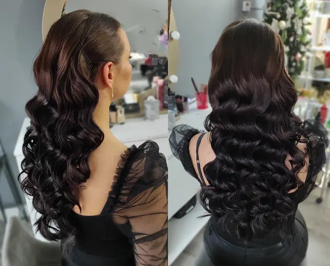  Lśniący brązowy kolor włosów ułożony w eleganckie fale, widok z tyłu kobiety w sali fryzjerskiej. 